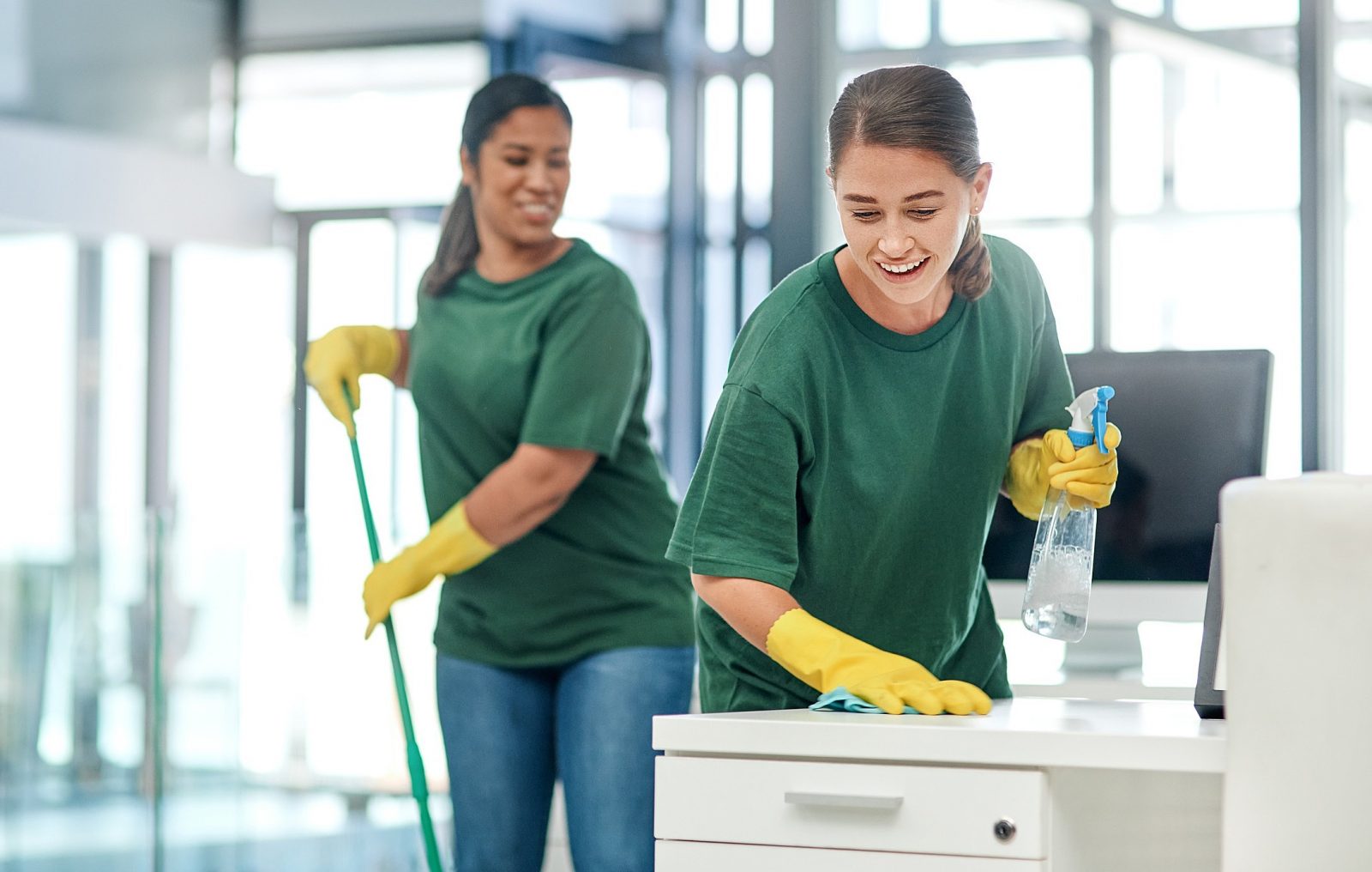 Visitors clean their. Advantage of hiring a Cleaning Company. Cleaning Mind. Woman cleans Office. Helping out by keeping the Floor by her Desk clean..